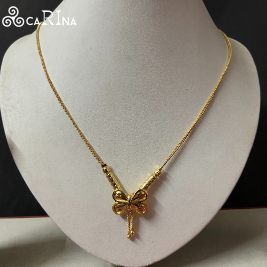 Golden Grace Bow Pendant